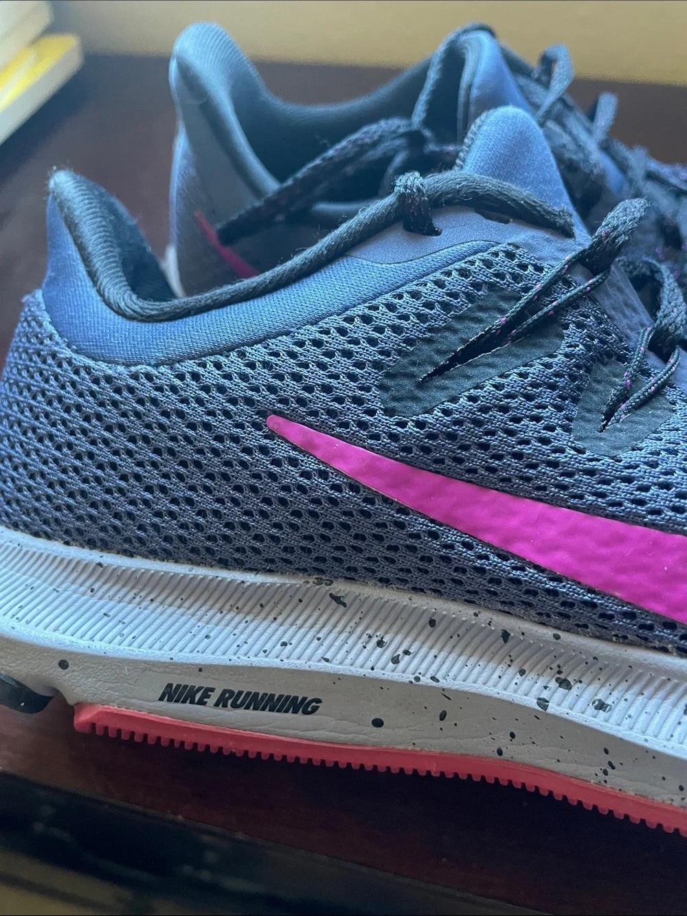 Nike Women’s Gray Athletic Shoes with Pink Swoosh